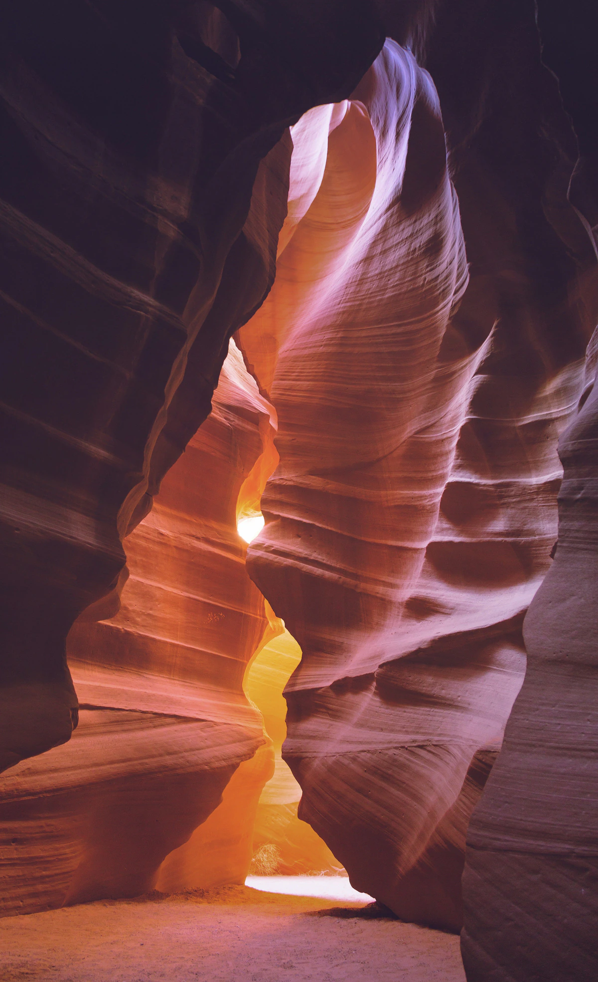 Tall purple and orange sandstone chamber in Antelope Canyon